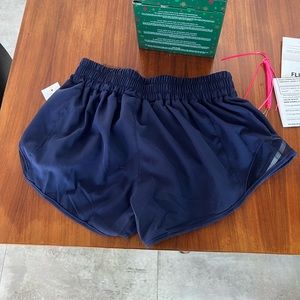 BLUE ATHLETIC SHORTS NEVER WORN BEFORE WOMENS SIZE 4